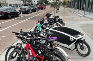 Bikes Parked at bike rack including cargo bike