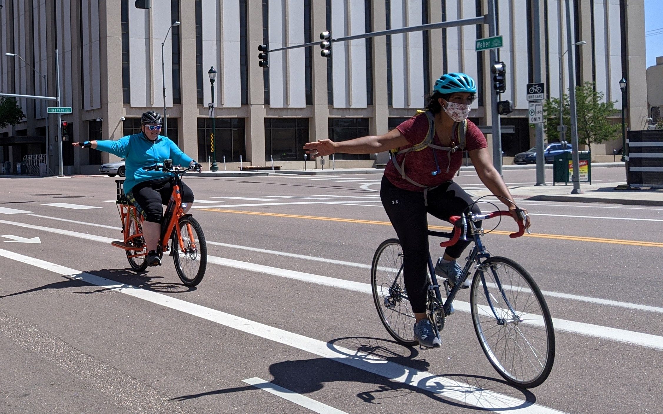 Senate Bill 36 would fund safer streets like parking protected bike lanes on Pikes Peak Ave in Downtown COS